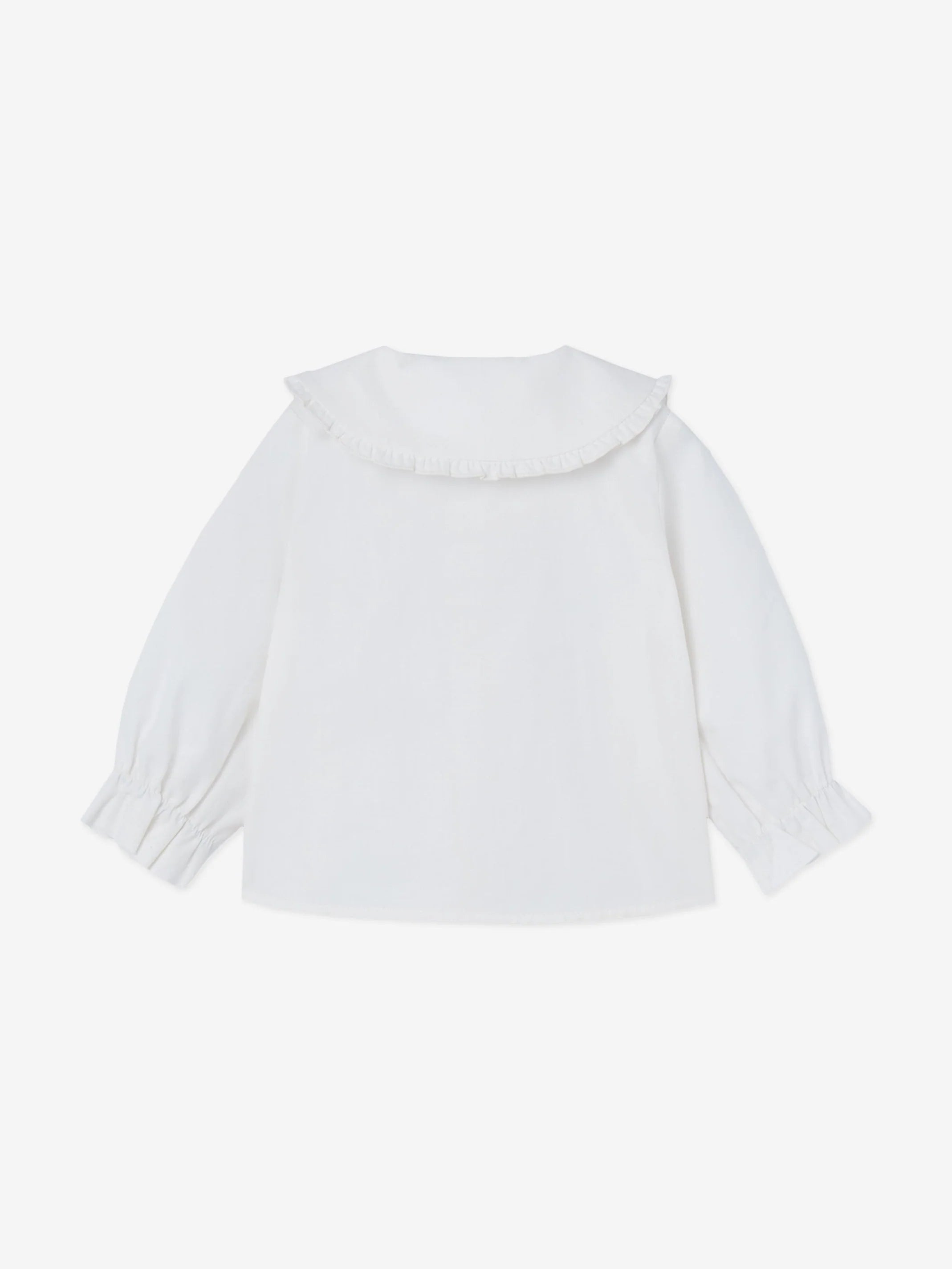 Pompon woven blouse.
