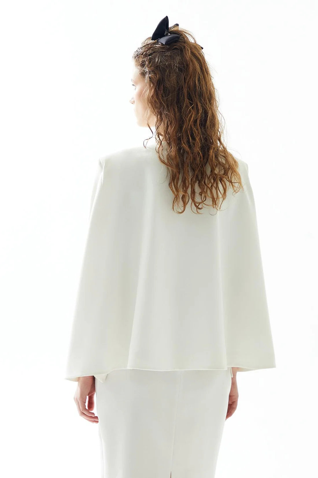 Jacket with slits on the sleeves and open front