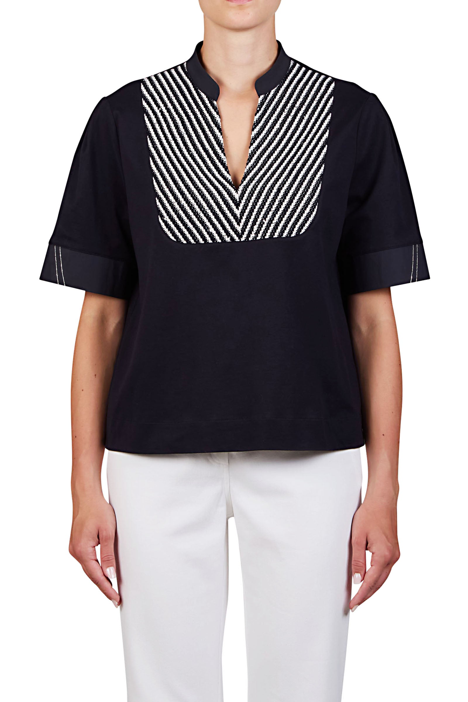 Polo blouse with knitted plastron.
