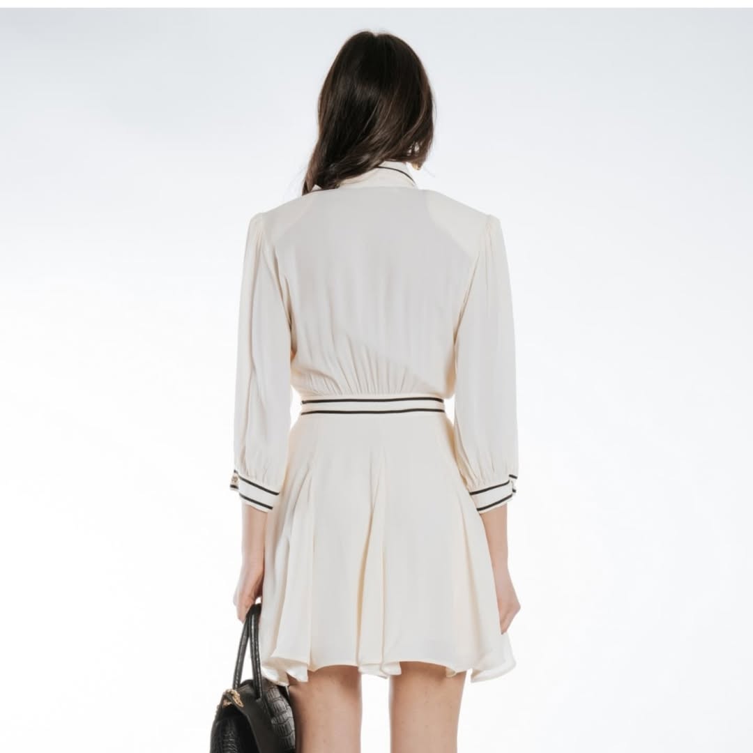 Chiffon dress with black trims