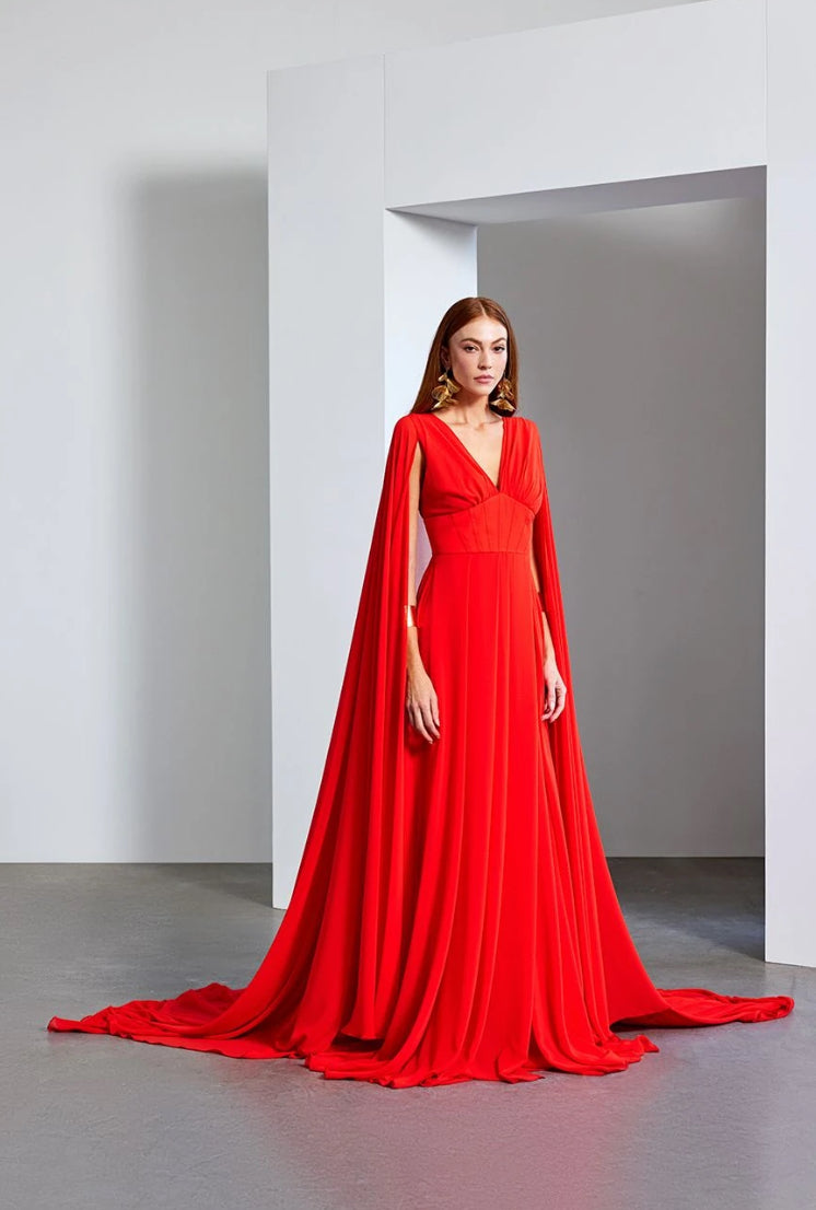 Elegant Cape Gown with Flowing Train