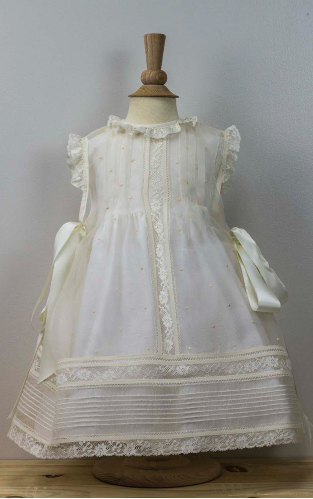 Vintage-Inspired Baby Dress with Lace Trim and Ruffled Sleeves