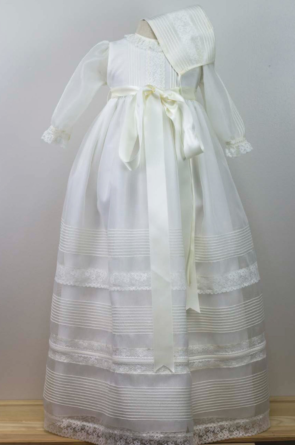 Elegant Long-Sleeve Baptism Gown with Pleated Detailing and Satin Ribbon