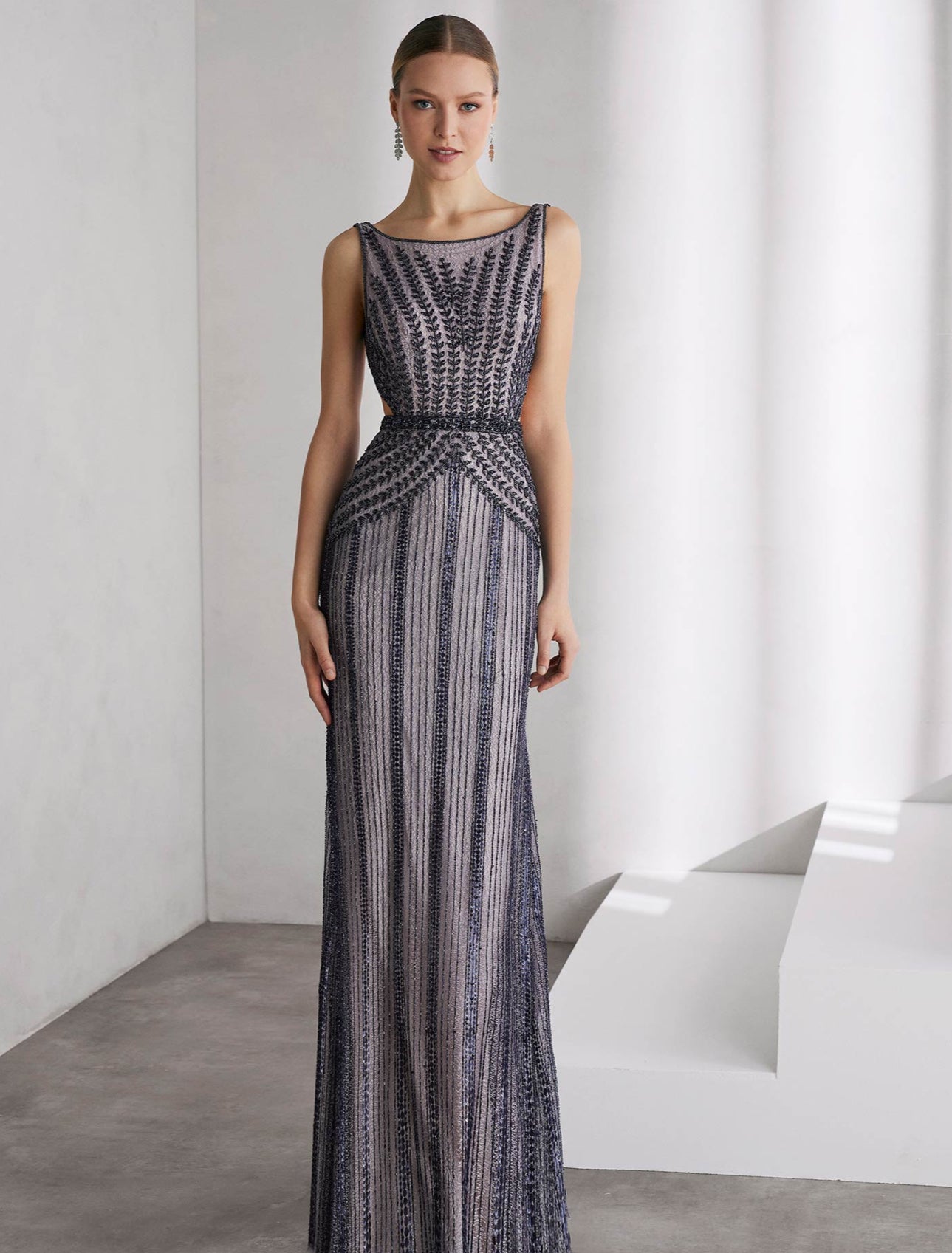 Beaded Gown with a Flowing Cape by Rosa Clará