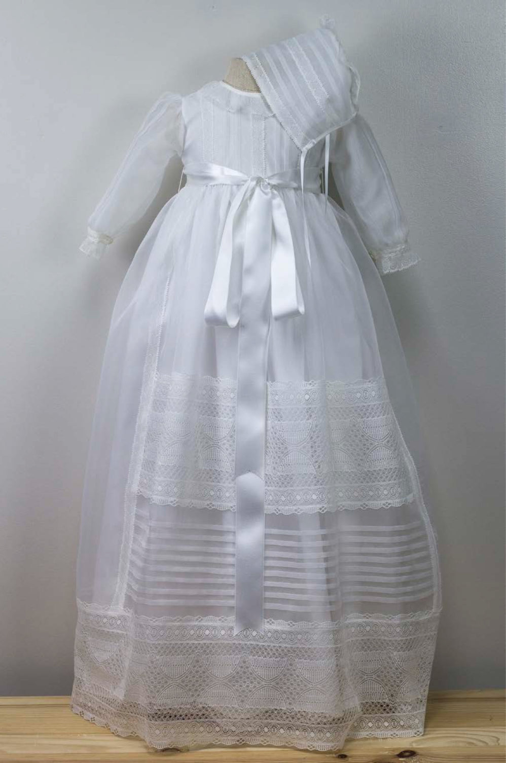 Classic Baptism Gown with Long Sleeves , Pleats , and Satin Ribbon Accents