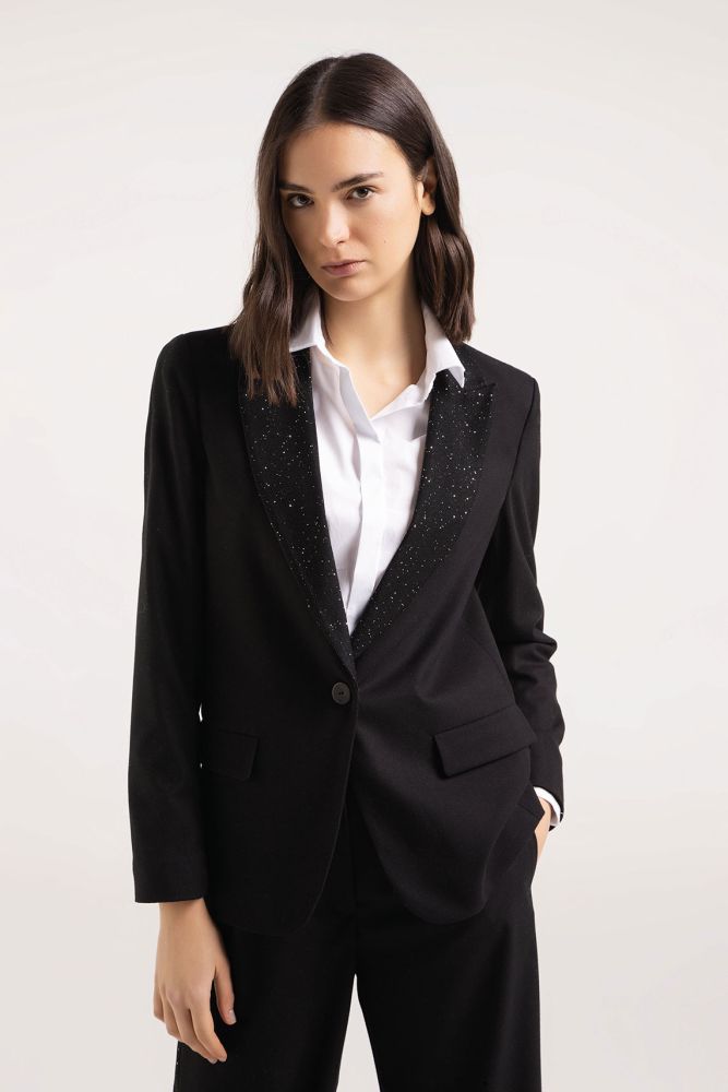 Blazer with sequined shawl collar.
