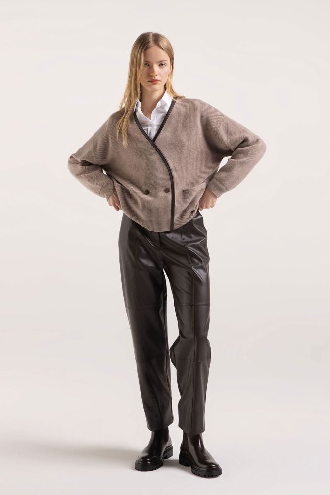 Cardigan with a leather trim.