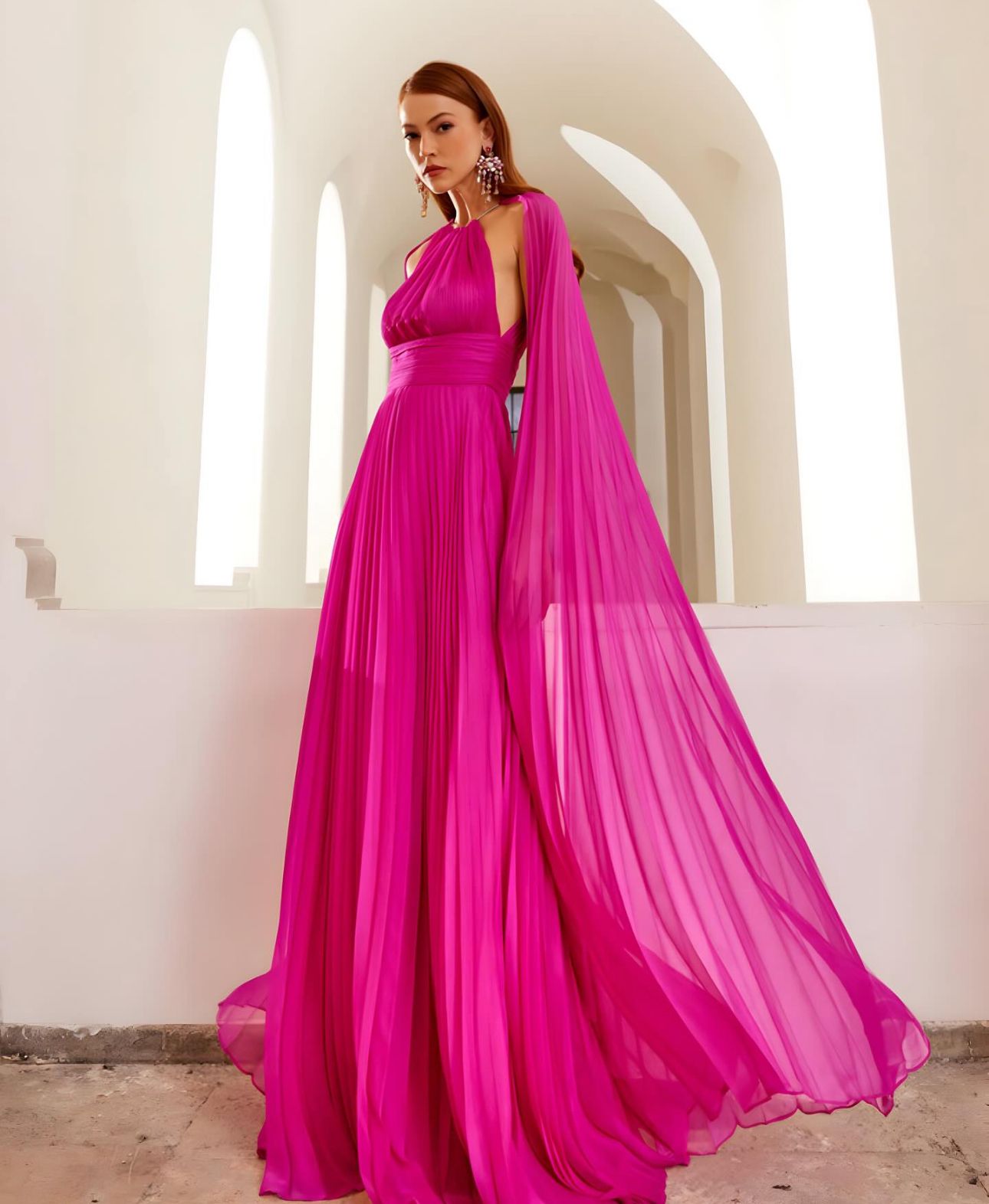 Graceful Sophistication in a Cape Sleeve Evening Gown