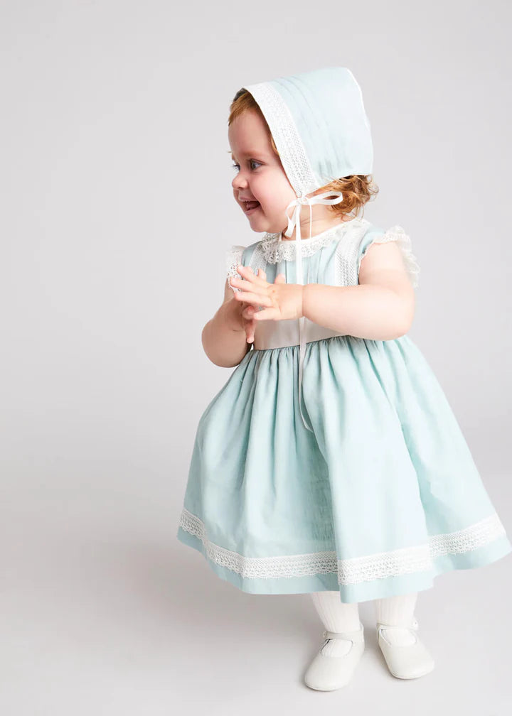 Lace trim ivory bow dress in teal