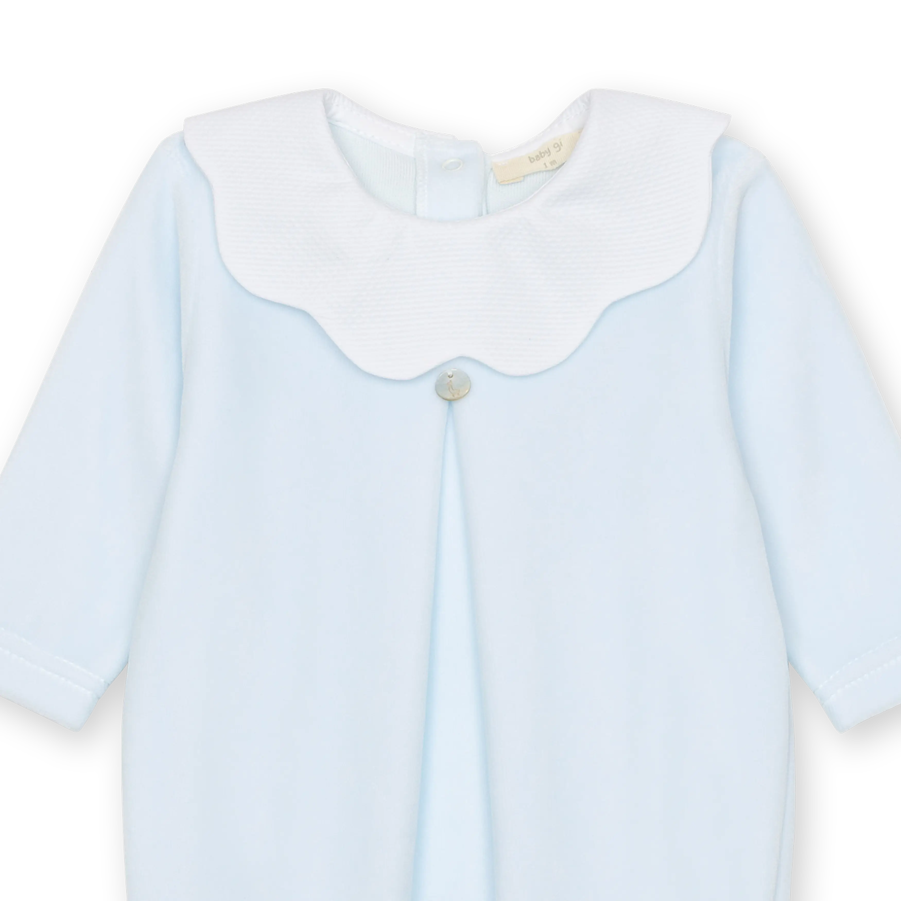 Velour babygrow with a flower trimmed collar