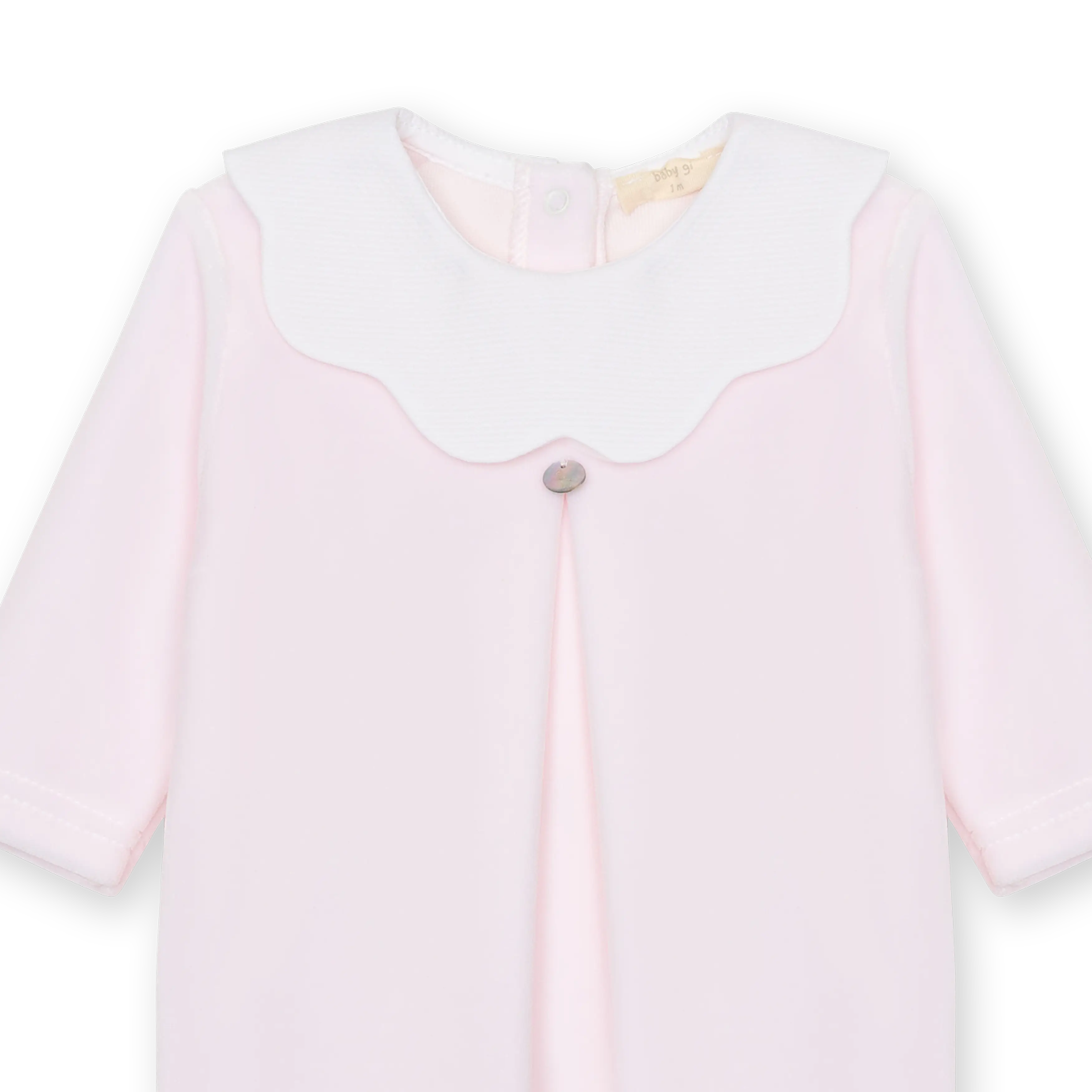 Velour babygrow with a flower trimmed collar