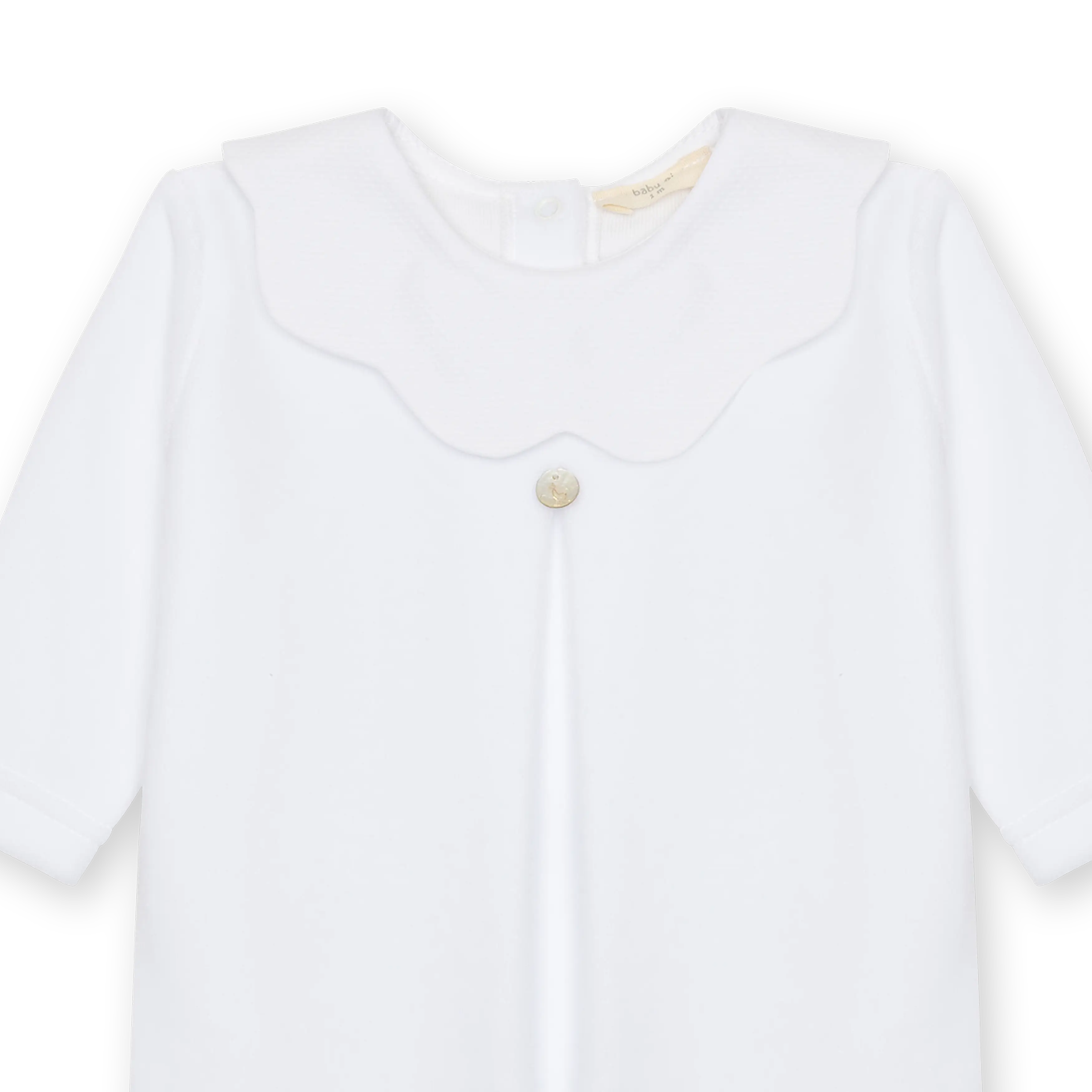 Velour babygrow with a flower trimmed collar
