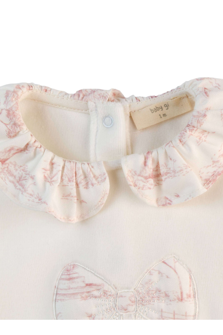 Vintage babygrow with a bow