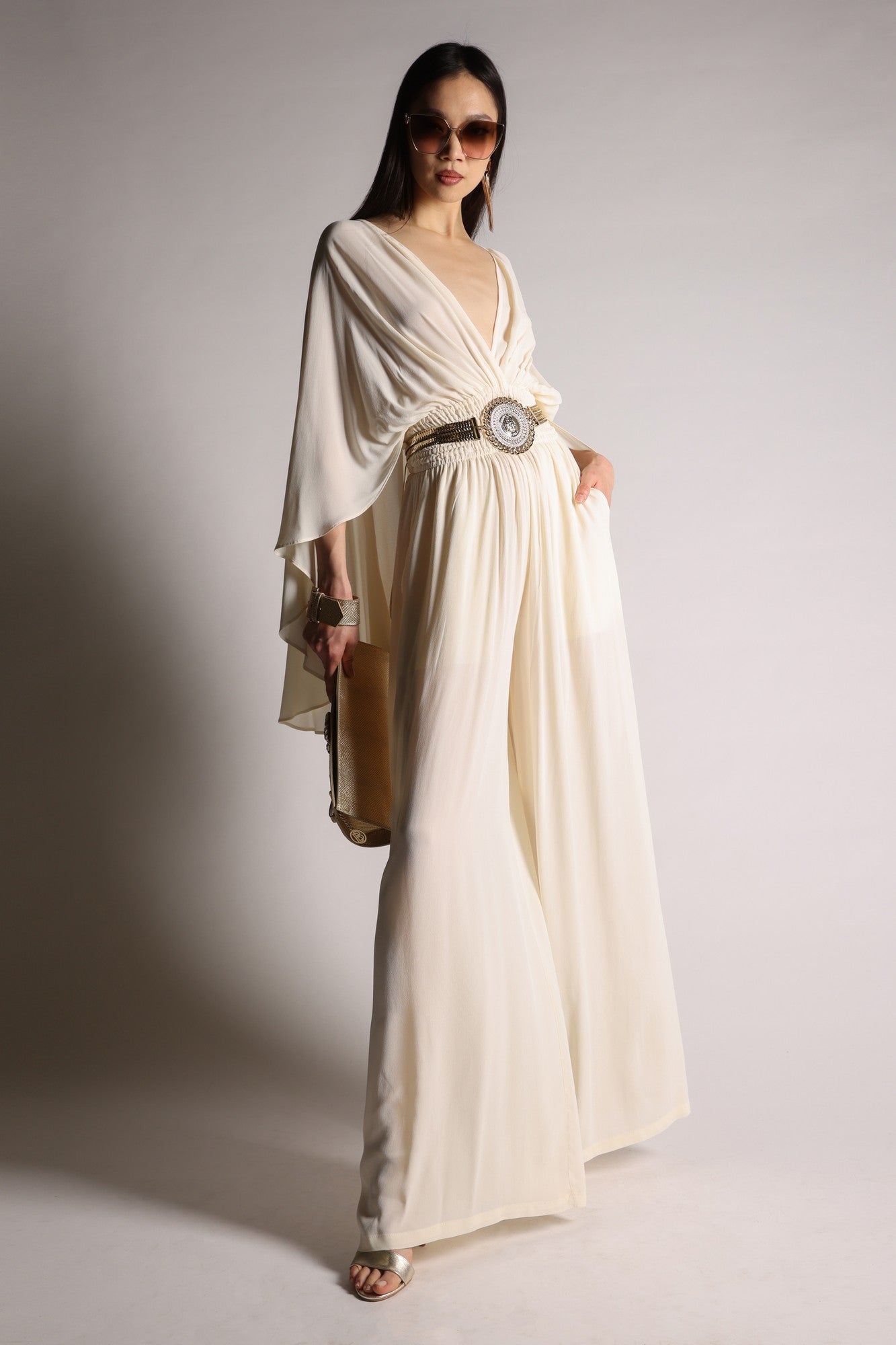Jumpsuit with cape and removable flower