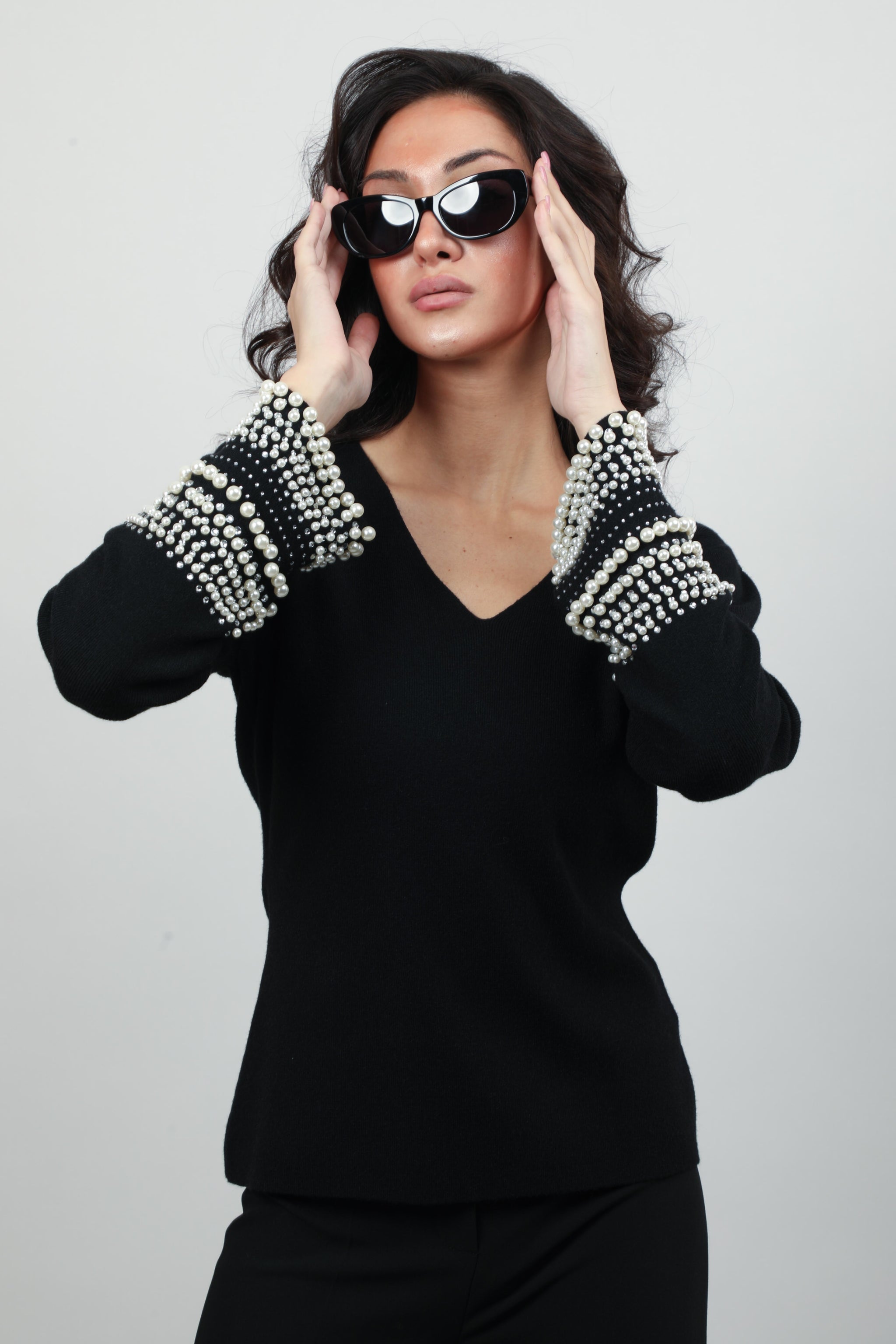 Knitwear with Statement Pearl Cuffs